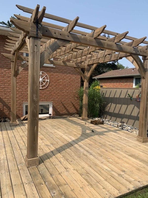 Professional deck staining with uniform coverage and rich colour
